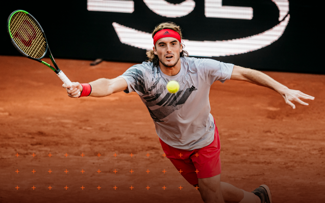 Tennis player running to get the ball in time